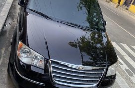 Selling Black Chrysler Town And Country 2010 in Pasig