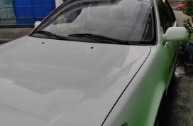 White Toyota Altis 2000 for sale in Manila