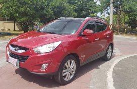 Selling Red Hyundai Tucson 2012 in Pasig