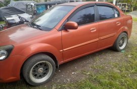 Orange Kia Rio 2015 for sale in San Pablo City