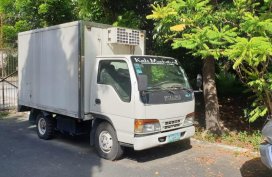 Pearl White Isuzu Elf 1999 for sale in Makati