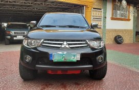 Sell Black 2012 Mitsubishi Strada in Manila