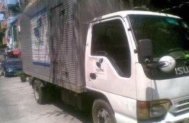 White Isuzu Elf 2004 for sale in Manila