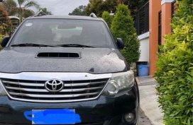Selling Black Toyota Fortuner 2014 in Davao