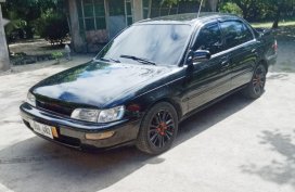 Selling Black Toyota Corolla 1997 in Floridablanca
