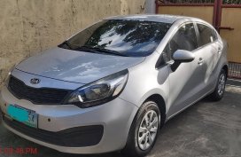 Selling White Kia Rio 2012 in Quezon