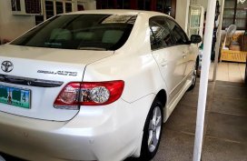 Selling Pearlwhite Toyota Corolla Altis 2012 in Muntinlupa