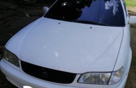 White Toyota Corolla 1999 for sale in Pinamungajan