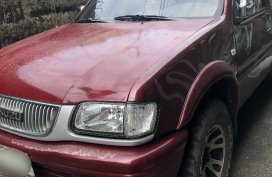Selling Red Isuzu Fuego 2006 in Quezon