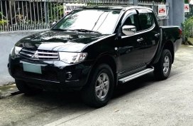 Black Mitsubishi Strada 2012 for sale in Quezon