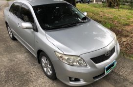 Brightsilver Toyota Corolla Altis 2010 for sale in Quezon