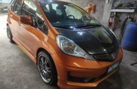Selling Orange Honda Jazz 2012 in Valenzuela