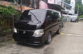 Black 2009 Nissan Urvan Van for sale