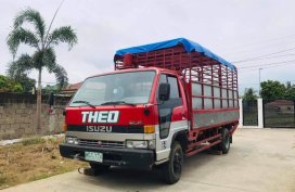 Sell Red 1992 Isuzu Elf in Balayan