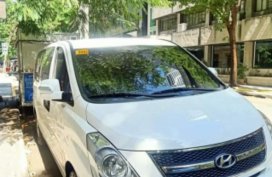 Selling White 2015 Hyundai Grand Starex TCI 2.5 GL MT (18-seater) Second Hand
