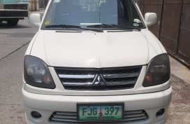 Selling White 2013 Mitsubishi Adventure 