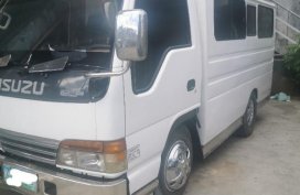Pearl White Isuzu Elf 2010 for sale in Rizal