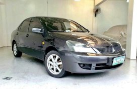 Selling Greyblack Mitsubishi Lancer 2011 in Quezon City