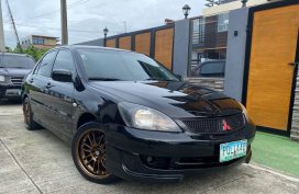 Selling Black Mitsubishi Lancer 2011 in Manila