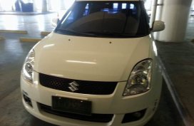 Sell White 2010 Suzuki Swift in Talisay