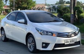 Pearl White Toyota Corolla Altis 2014 for sale in Calasiao