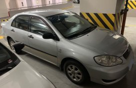 Selling Brightsilver Toyota Corolla Altis 2005 in Manila
