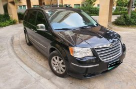 Selling Black Chrysler Town And Country 2011 in Pasig