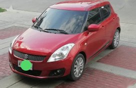Red Suzuki Swift 2013 for sale in Lupao