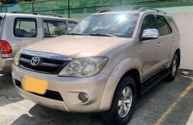 Pearl White Toyota Fortuner 2006 for sale in Balete 