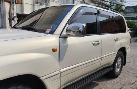 Pearl White Toyota Land Cruiser 2001 for sale in Quezon