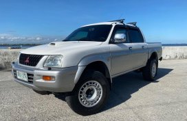 Selling Pearl White Mitsubishi L200 Strada 2003 in Manila