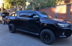 Black Toyota Hilux 2016 for sale in Talisay