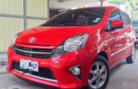 Selling Red Toyota Wigo 2016 in Quezon City