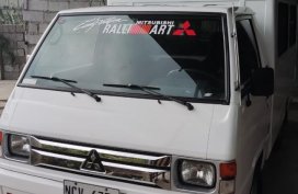 Selling White Mitsubishi L300 2018 in Marilao