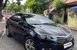 Selling Black Toyota Corolla Altis 2014 in Marikina
