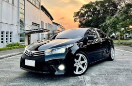 Sell Black 2014 Toyota Corolla altis in Quezon City
