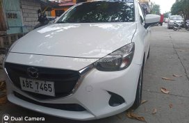 Second hand White 2016 Mazda 2  SKYACTIV S Sedan AT for sale