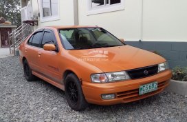 Selling old but goods 1998 Nissan Sentra B14/orange