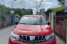Very good condition, low Kilometer, lady driven Mitsubishi Strada. 