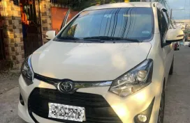  Selling White 2018 Toyota Wigo Hatchback by verified seller