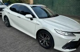 Toyota Camry 2.5L V HE hybrid 2023 model, platinum white pearl 