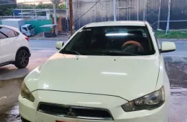 Selling White 2010 Mitsubishi Lancer Ex 