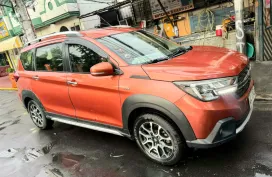 Selling a SUPER GOOD CONDITION 2021 Suzuki XL7 GLX A/T in Orange