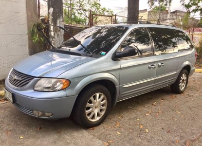 used chrysler town and country vans near me