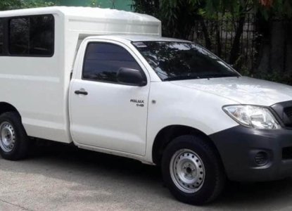 toyota hilux closed van price