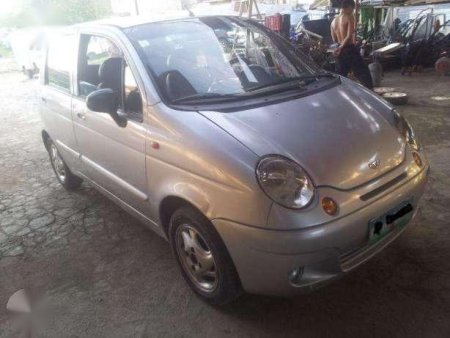 mazda famila или matiz