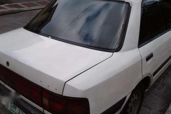 1995 Mazda 323 all original color white