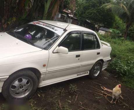 mitsubishi lancer 1998 acquired