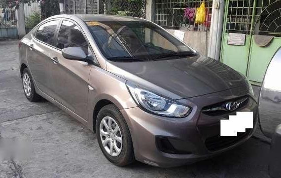 2013 Gray Hyundai Accent sedan eon mirage rio picanto alto mazda