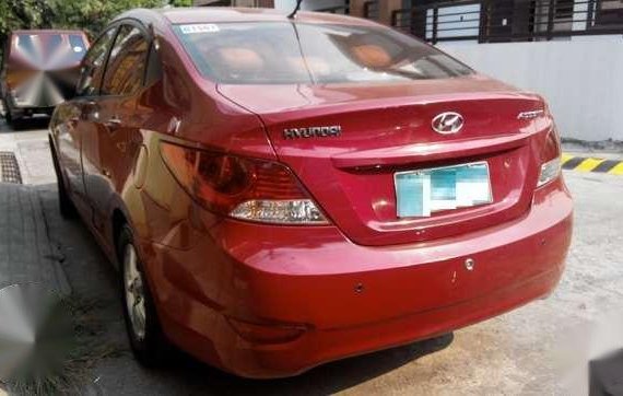 Mt Red Hyundai Accent 2013..